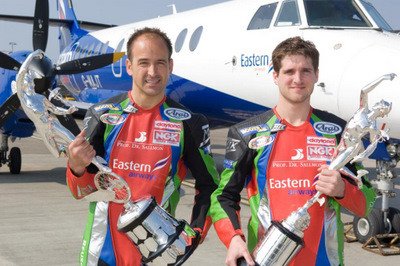 Tim Reeves (left) and Patrick Farrance gets their hands on the Isle of Man TT Sidecar trophies during a flying visit to the Isle of Man (Eastern Airways)